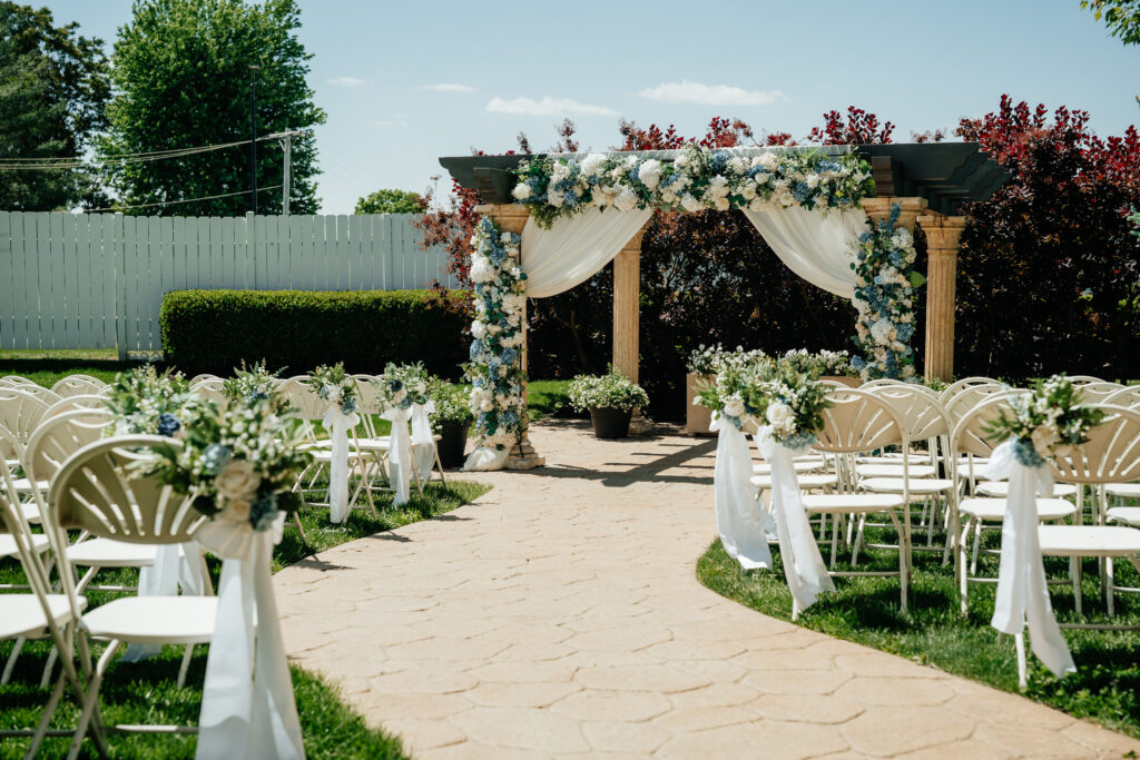 outdoor garden wedding in kansas city, independence, missouri. florals and fabric, 250 guests, large guest count, outdoor ceremony, rain back up ceremony option